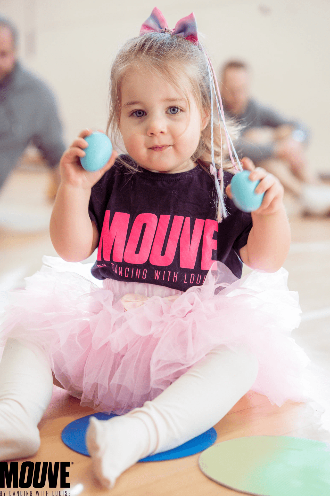 Toddler in MOUVE t-shirt and tutu enjoying a Little Ones party