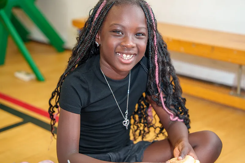 Children doing street dance moves at a birthday party
